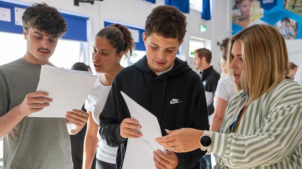 Students receive their GCSE results at Llanishen High School in Wales