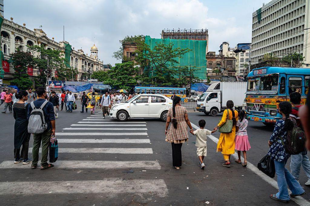 Traffic congestion and pedestrian safety issues are observed at the Dharmatala crossing in Kolkata.