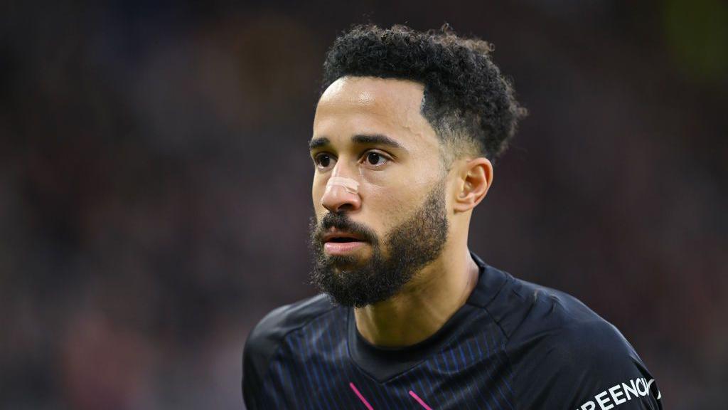 Andros Townsend of Luton Town looks on during the Premier League match between Sheffield United and Luton Town