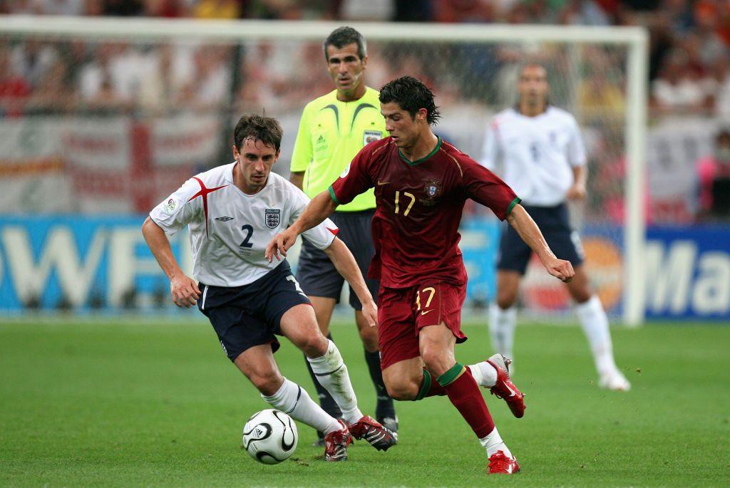 Gary Neville of England and Cristiano Ronaldo of Portugal challenge during the FIFA World Cup Finals 2006 Quarter Final match between England and Portugal at Arena Aufschalke on July 1, 2006 in Gelsenkirchen, Germany. (Photo by Richard Sellers/Sportsphoto/Allstar via Getty Images)