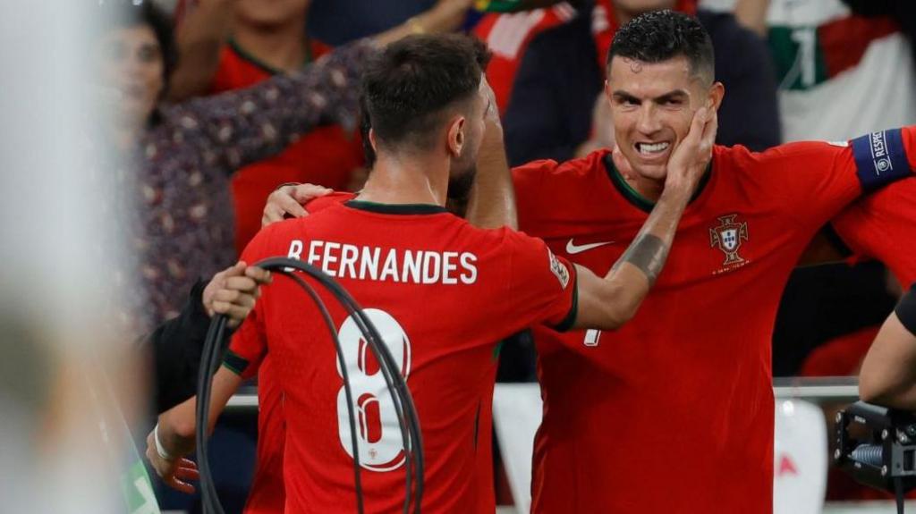 Portugal's Bruno Fernandes and Cristiano Ronaldo celebrate