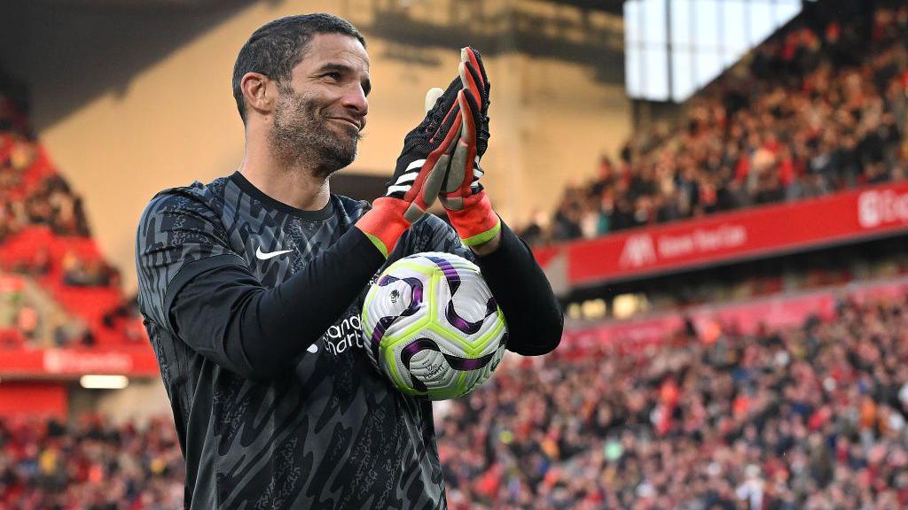 Former Liverpool goalkeeper David James sarcastically applauds the fans at Anfield after they booed him for saving a kid's half-time penalty twice. 