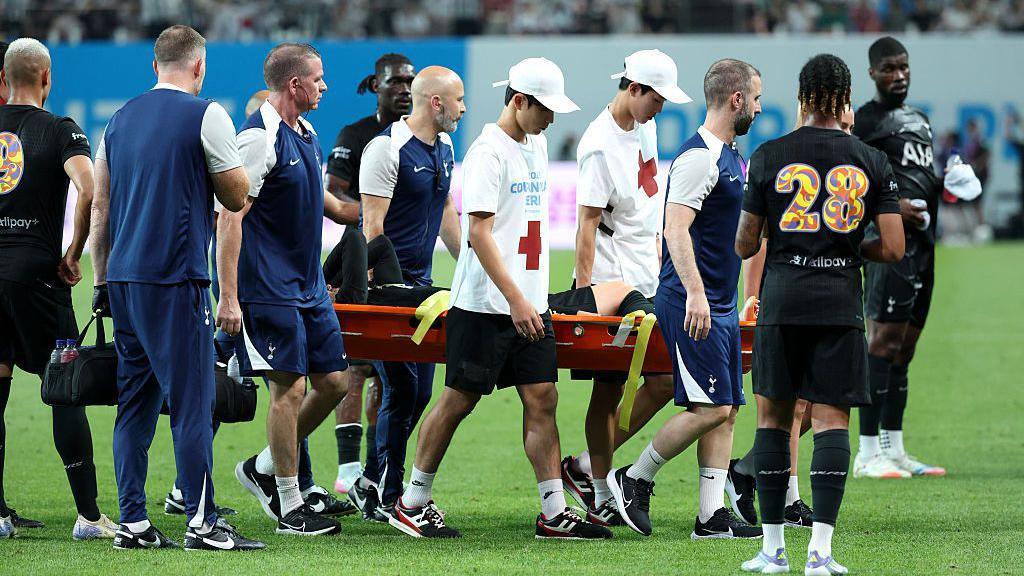 James Maddison being stretchered off