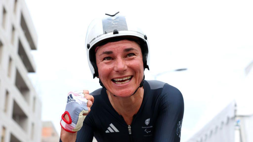 Sarah Storey celebrates after winning gold at the Paralympics