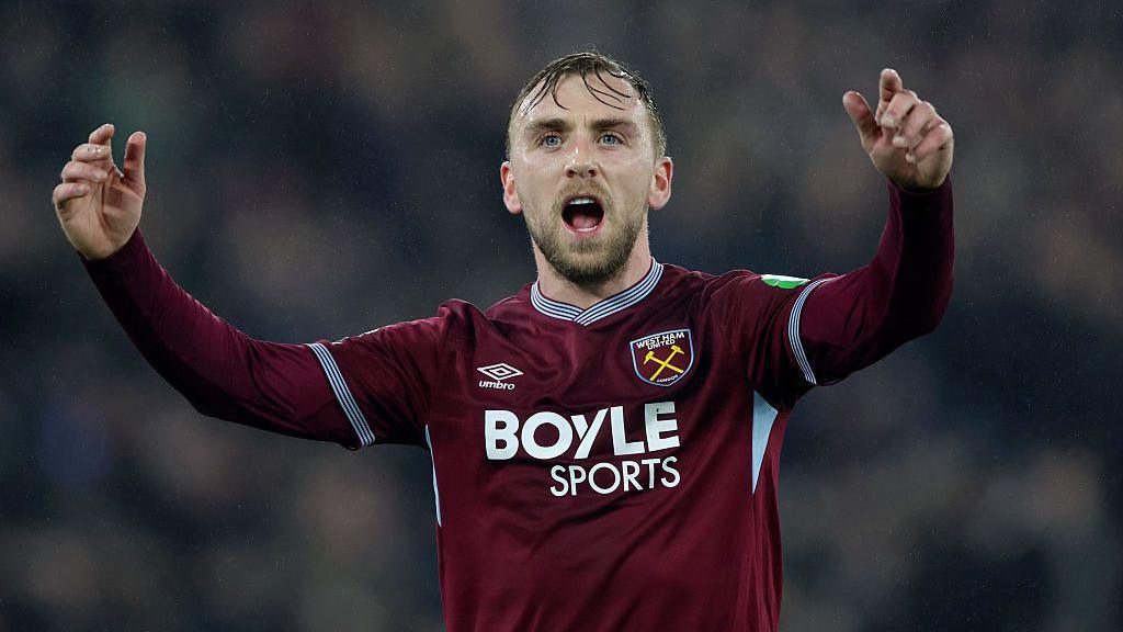 Jarrod Bowen throws his arms up in the air