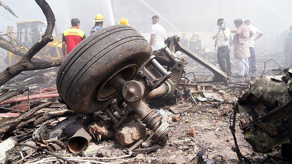 Aircraft landing gear at the crash site of Air India Ltd. flight AI171 in Ahmedabad, Gujarat, India, on Thursday, June 12, 2025. An Air India Boeing 787 Dreamliner traveling from Ahmedabad to London's Gatwick airport crashed shortly after taking off, in what stands to be the most serious accident involving the US planemaker's most advanced widebody airliner. Photographer: Siddharaj Solanki/Bloomberg via Getty Images