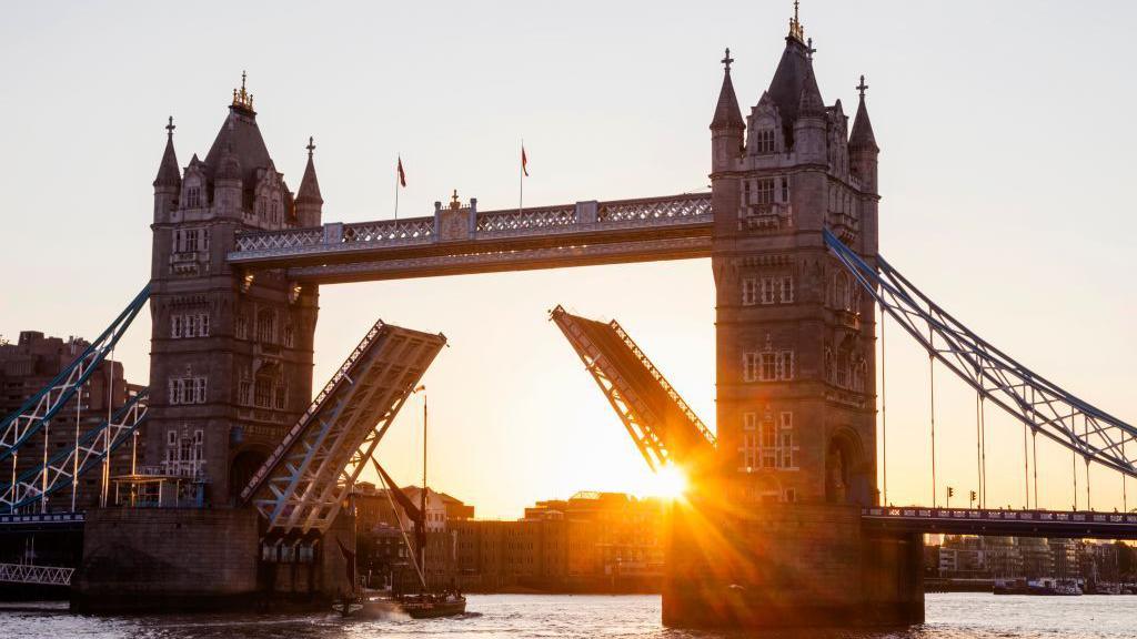 Tower Bridge opening at sunrise