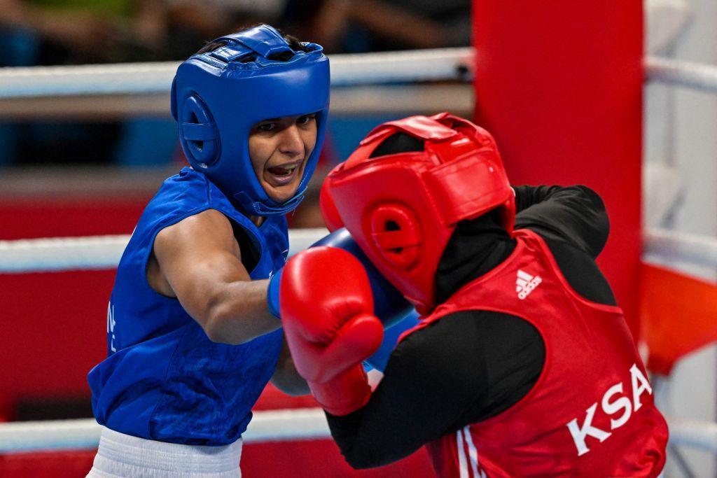Saudi Arabia's Ashour Hadeel Ghazwan and India's Jaismine Lamboria (blue) compete in their women's 57-60Kg preliminary round boxing match during the Hangzhou 2022 Asian Games in Hangzhou, on September 28, 2023. (Photo by Ishara S. KODIKARA / AFP) (Photo by ISHARA S. KODIKARA/AFP via Getty Images)