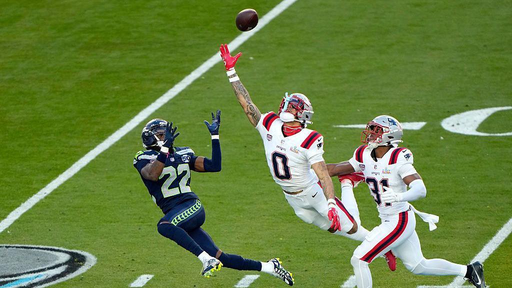 New England Patriots defender Christian Gonzalez nearly picks off Rashid Shaeed.