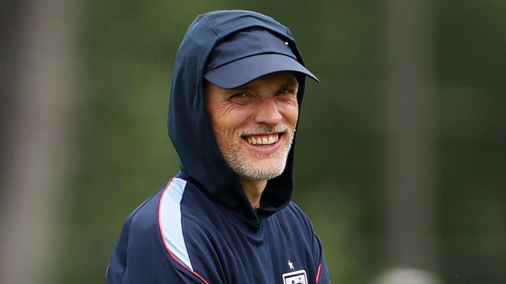 Thomas Tuchel smiles at England training