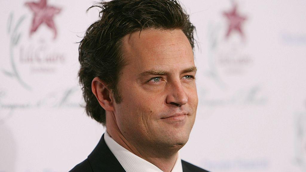 Friends star Matthew Perry is seen in a black suit