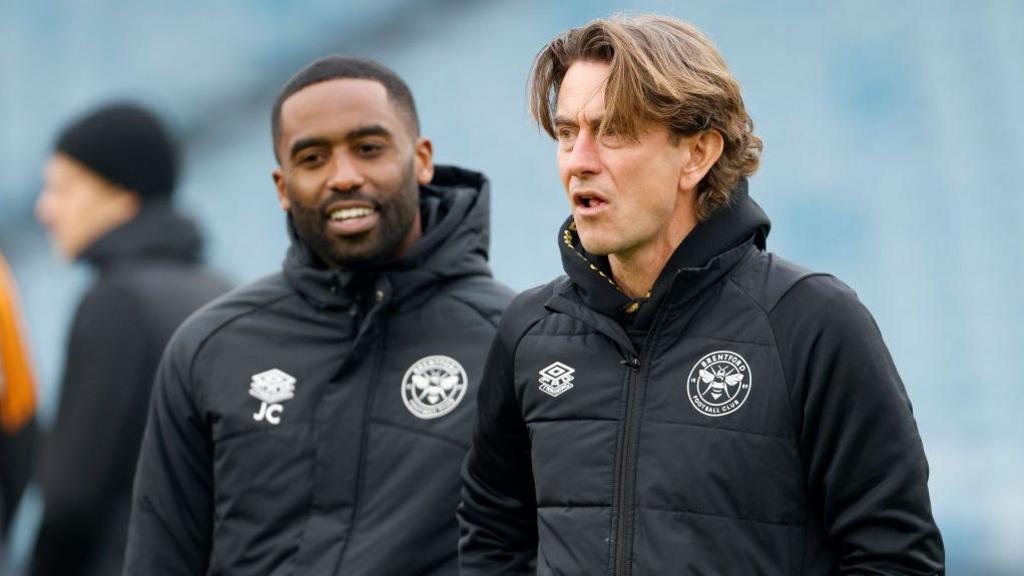 Justin Cochrane and Thomas Frank