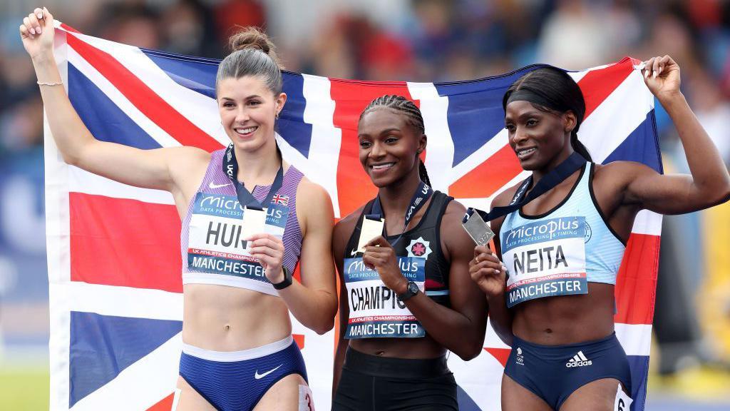 Bronze medalist Amy Hunt of Team Charnwood AC, gold medalist Dina Asher-Smith of Team Blackheath & Bromley Harriers A and silver medalist Daryll Neita of Team Cambridge Harriers pose for a photo after Women's 200 Metres Final on Day Two of UK Athletics Championships in 2024
