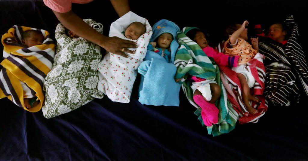 Newly born babies rest inside a ward on the occasion of World Population Day at Government Children's Hospital in Chennai.