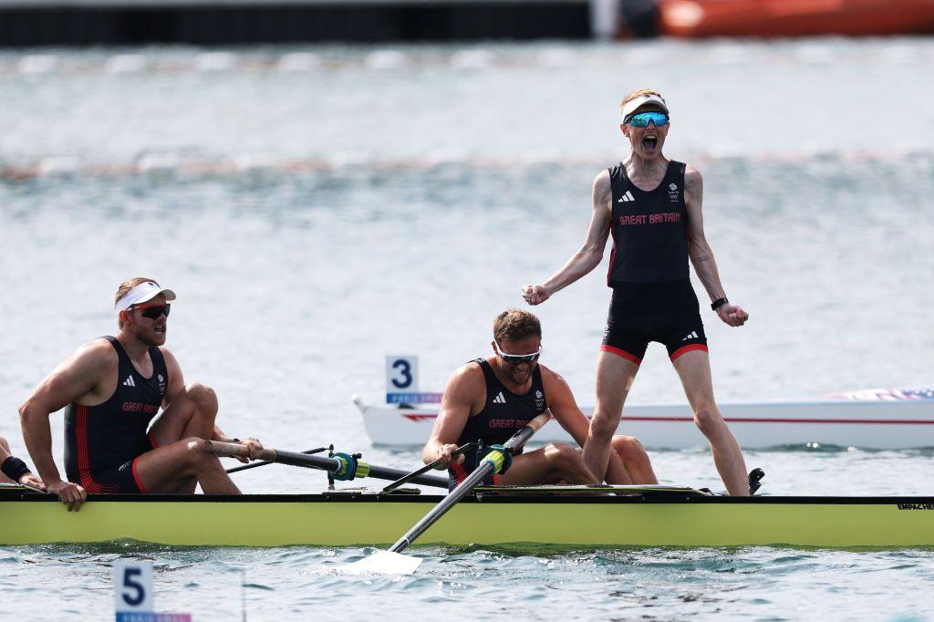 Harry Brightmore celebrates as Tom Ford, James Rudkin, Tom Digby, Charles Elwes, Jacob Dawson, Morgan Bolding, Rory Gibbs and Sholto Carnegie of Team Great Britain win gold in the Men's Eight Finals