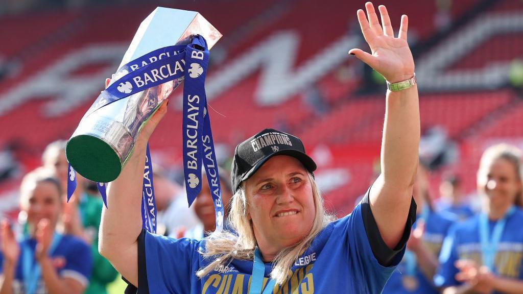 Emma Hayes the head coach / manager of Chelsea Women celebrates with the Women's Super League trophy.