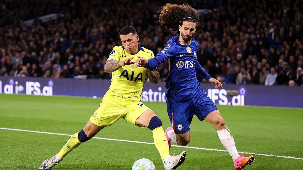 Pedro Porro and Marc Cucurella battle for the ball
