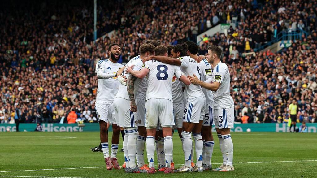 Joe Rodon celebrating with teammates