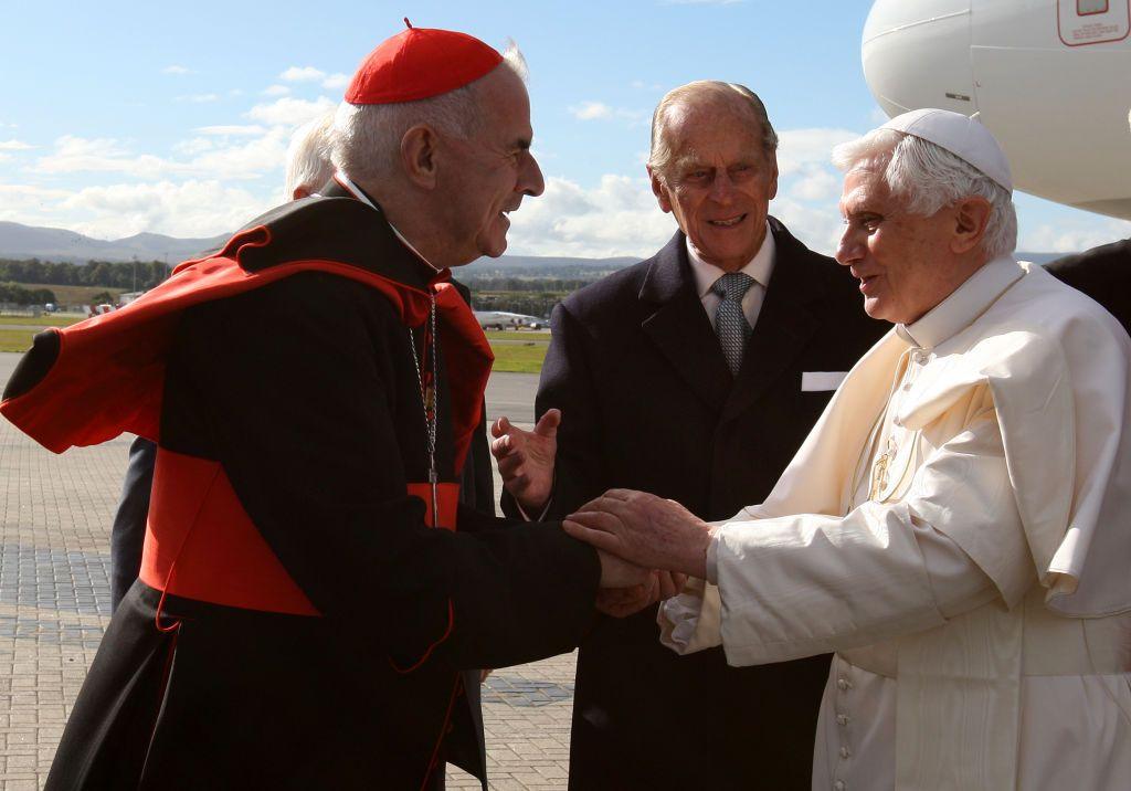 Pope Benedict XVI being greeted by Prince Philip, Duke of Edinburgh and Cardinal Keith O'Brien when he arrived at Edinburgh Airport at the start of a four-day visit to Britain in 2010