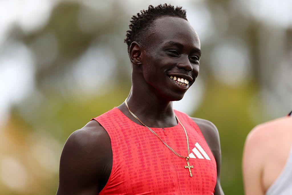 Gout Gout smiles on the track before competing in a sprint event in Peth, Australia.