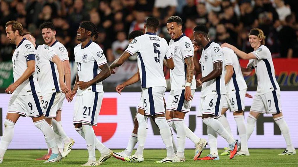 England celebrating a goal against Serbia