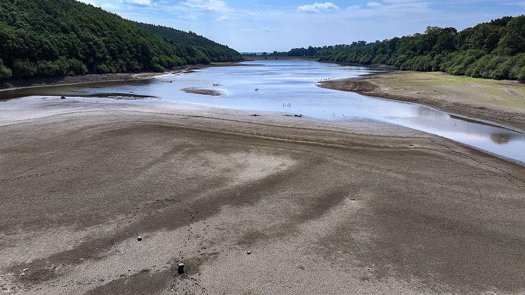 In this aerial view, low water levels reveal the reservoir bed at Lindley Wood Reservoir in Yorkshire after the driest spring in 132 years on June 17, 2025 in Otley, England. 