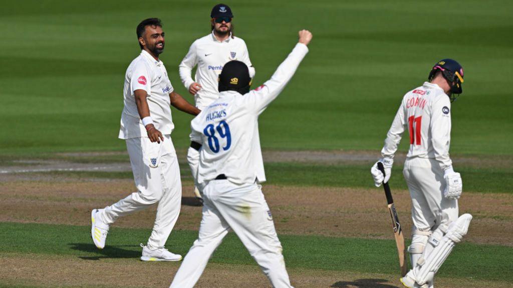 Sussex's Jaydev Unadkat celebrates taking the wicket of Glamorgan's Andy Gorvin