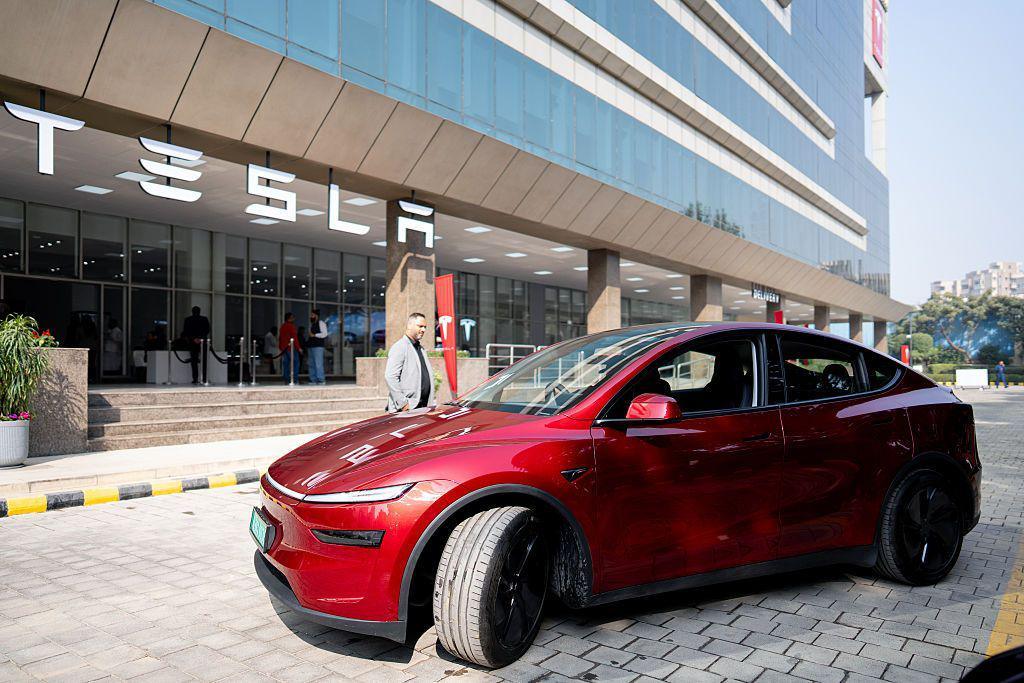 A Tesla Inc. Model Y electric vehicle at the company's Experience and Service Center in Gurugram, India, on Wednesday, Nov. 26, 2025. Tesla this month has appointed Sharad Agarwal as the automaker's country head in India, marking a shift in its approach to the market after a muted start to sales in the world's most-populous nation. Photographer: Anindito Mukherjee/Bloomberg via Getty Images