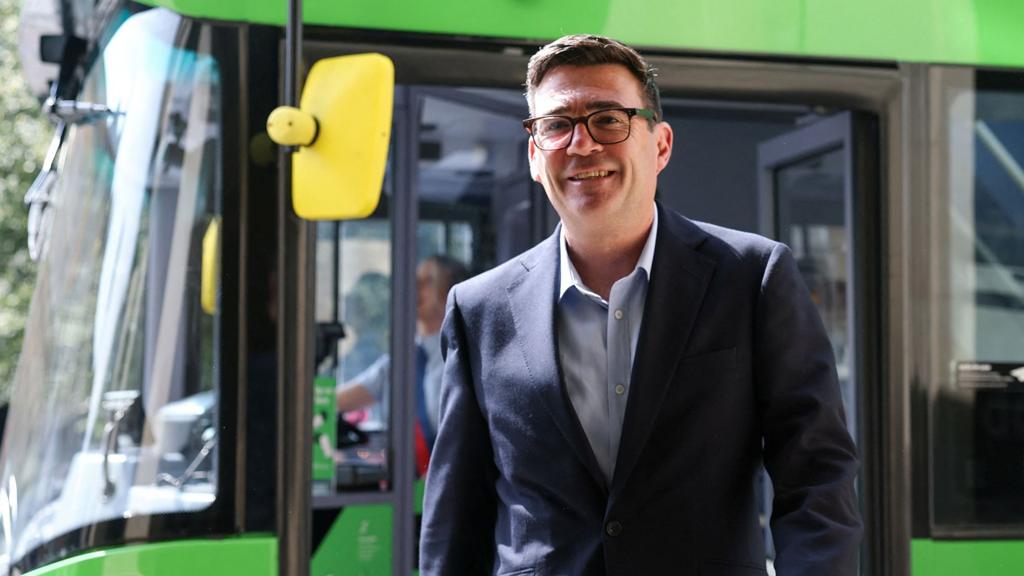 Andy Burnham says £2 bus fare cap in England being paid for by  're-prioritising' money - BBC News