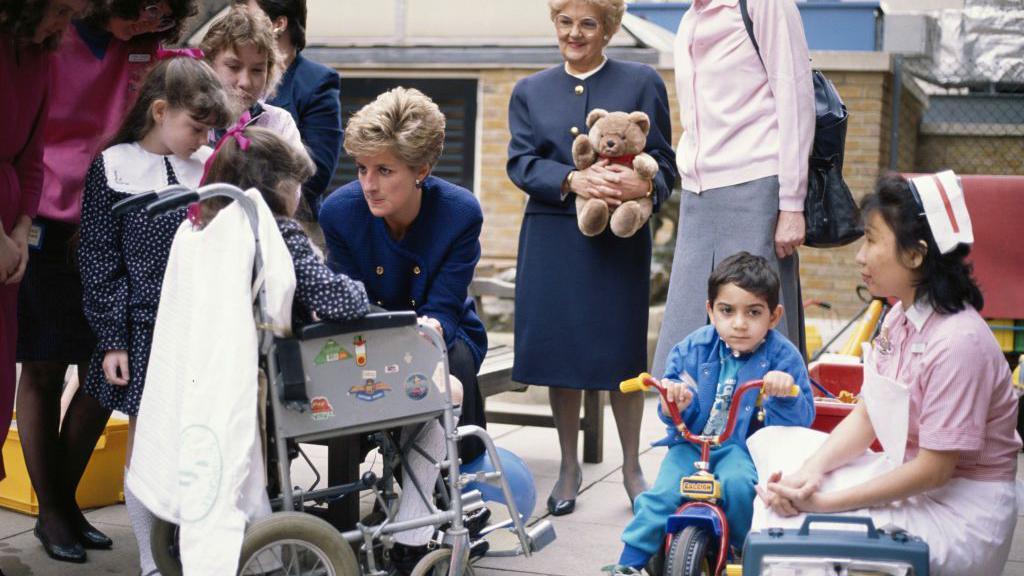 princess diana speaking with children from Great Ormond Street Hospital.