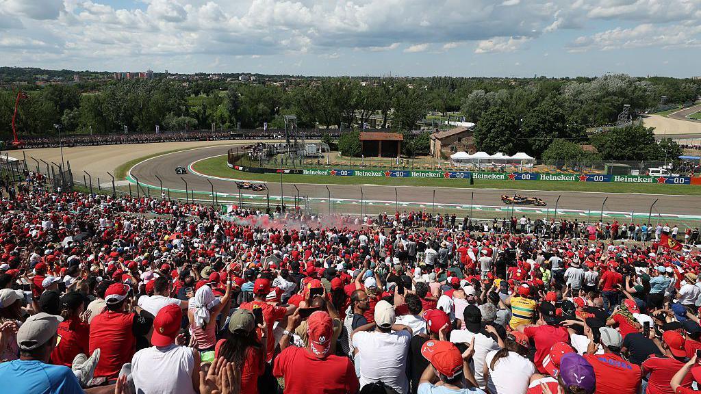 Fans watch the grand prix in Imola