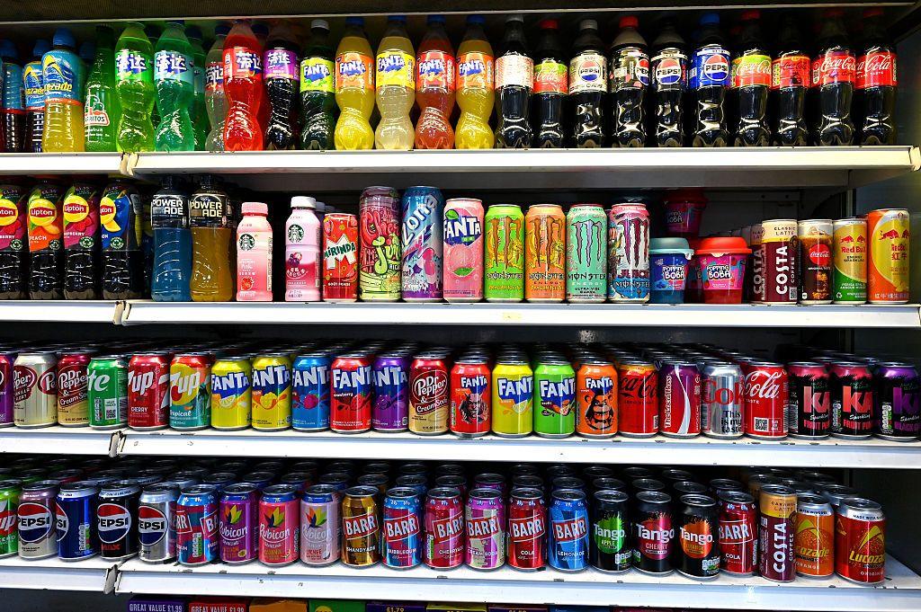 Shops shelves with drinks. 
