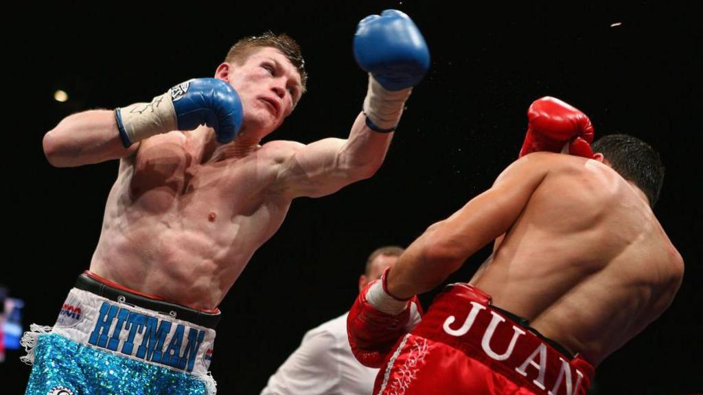 : Ricky Hatton hits Juan Lazcano with a left hand punch during the IBO light-welterweight title fight between Ricky Hatton and Juan Lazcano at the City of Manchester Stadium on May 24, 2008