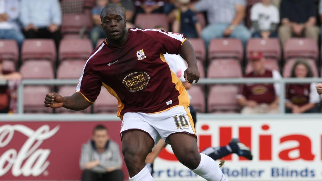 Adebayo Akinfenwa playing for Northampton Town