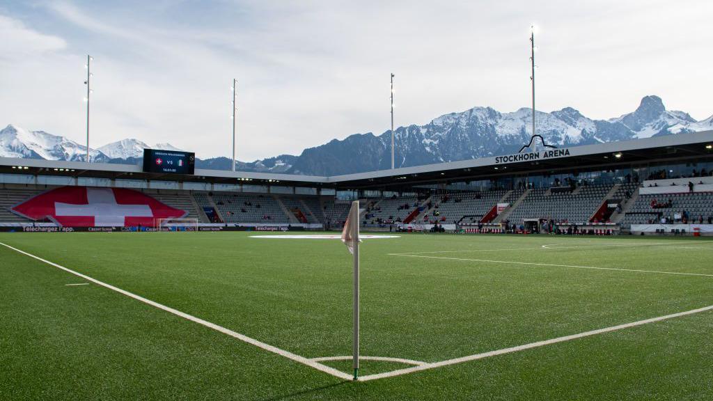 Stockhorn Arena in front of Swiss Alps 