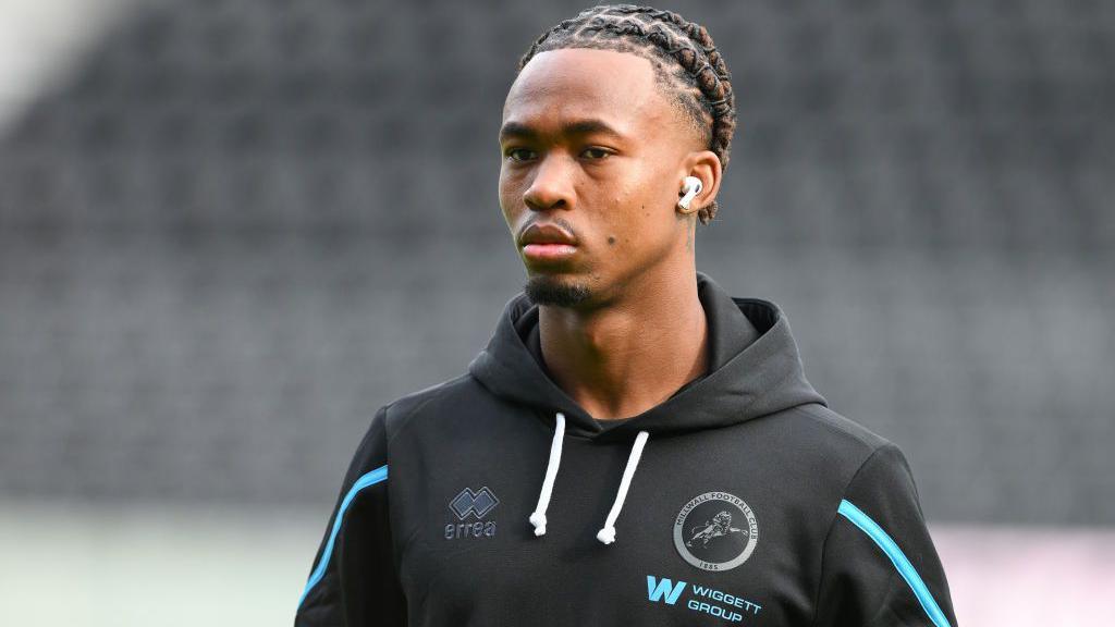 Zak Sturge, wearing a Millwall branded hoodie