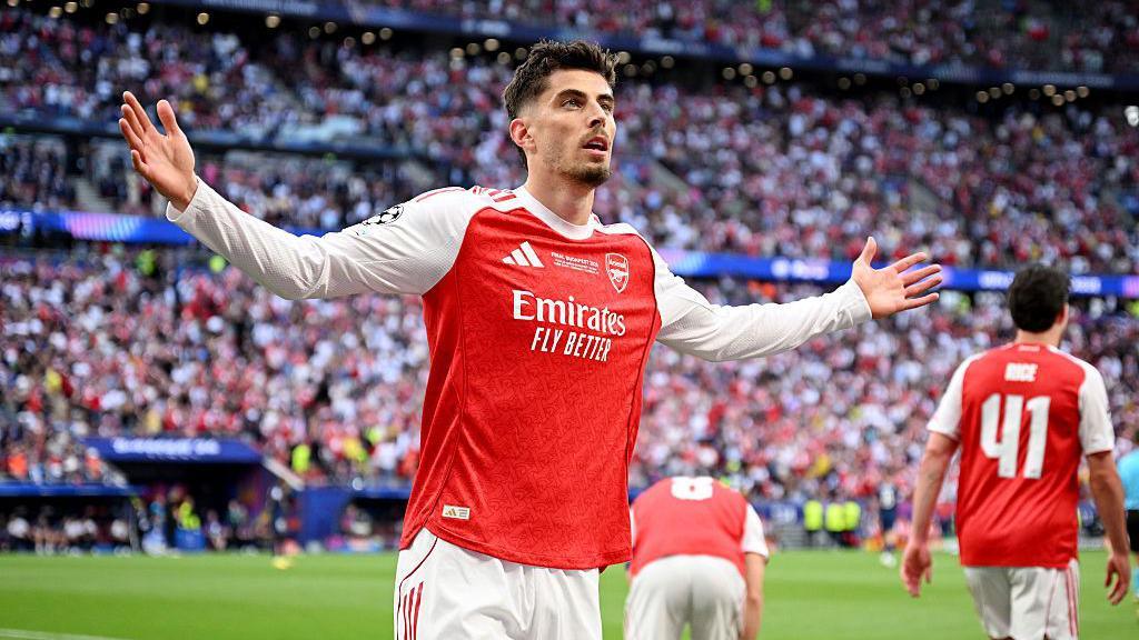 Kai Havertz celebrating with his arms outstretched
