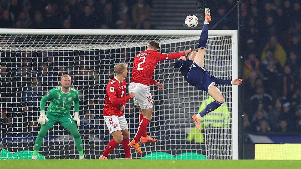 Scott McTominay scoring against Denmark.