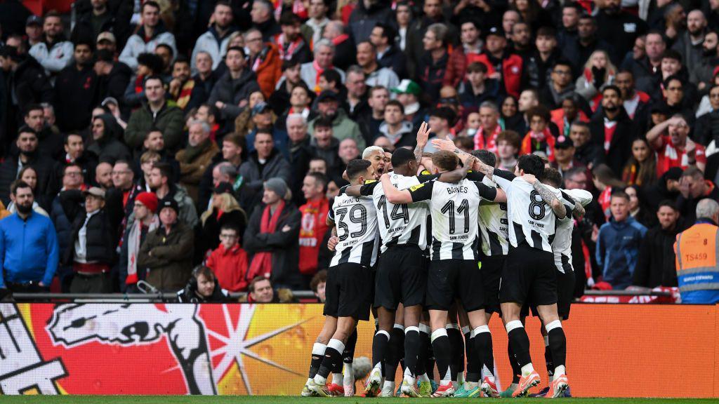 Dan Burn celebrates with his teammates