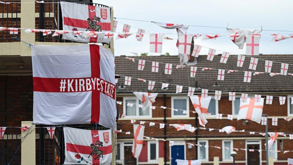 Kirby estate in London decorated with England flags