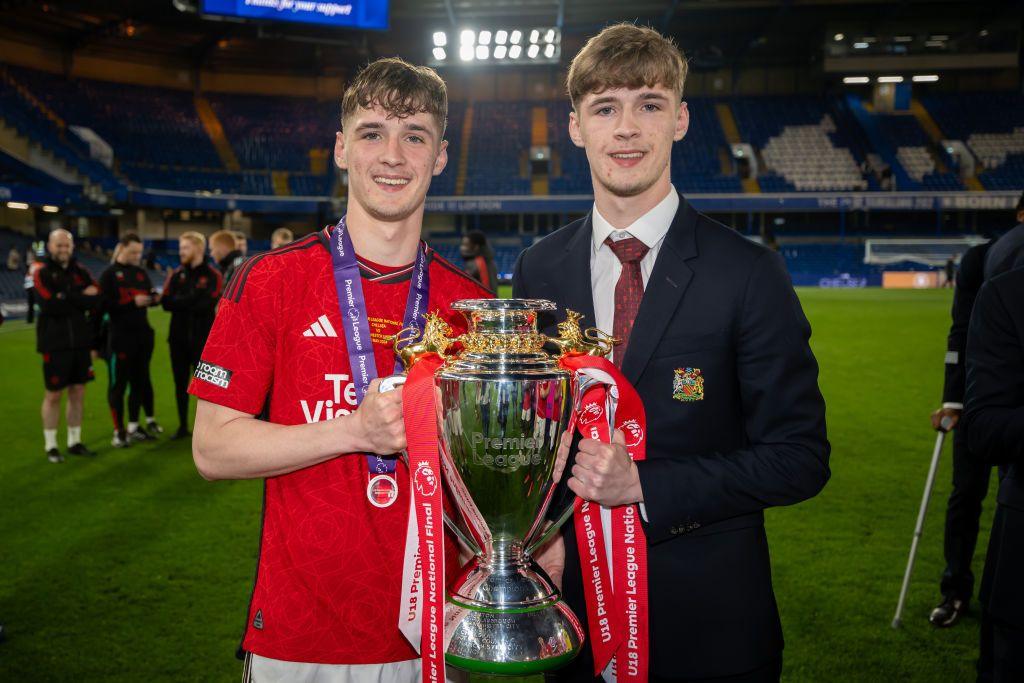 Jack and Tyler Fletcher celebrate winning the Under-18s Premier League title