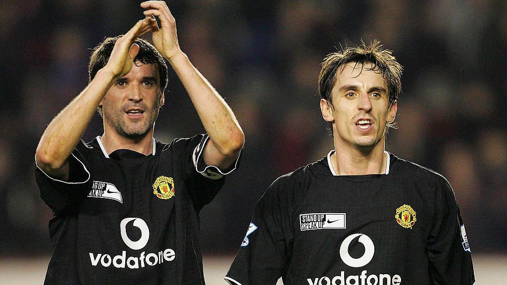 Roy Keane and Gary Neville celebrate Manchester United's win at Arsenal in 2005
