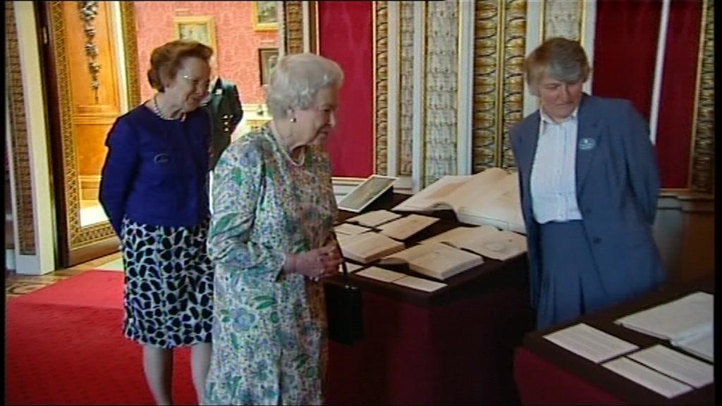 The Queen inspecting Queen Victoria's journals