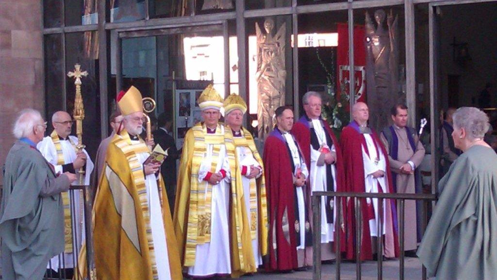 The Archbishop of Canterbury, the Bishop of Coventry outside Coventry Cathedral