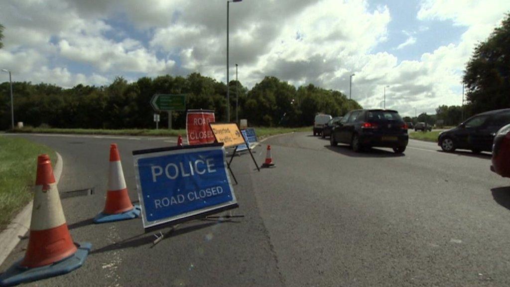 Road closed signs and cones