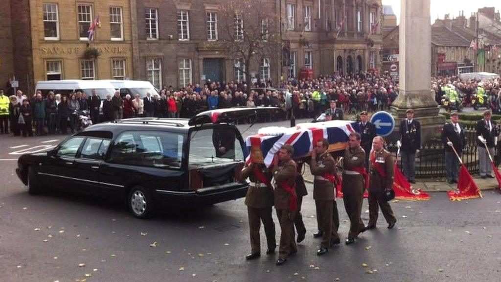 Sgt Gareth Thursby's coffin being carried into the church