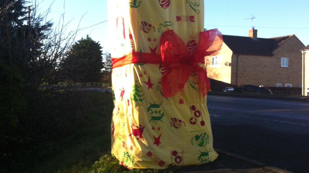 Post box wrapped up as a Christmas present in Prickwillow, Cambs