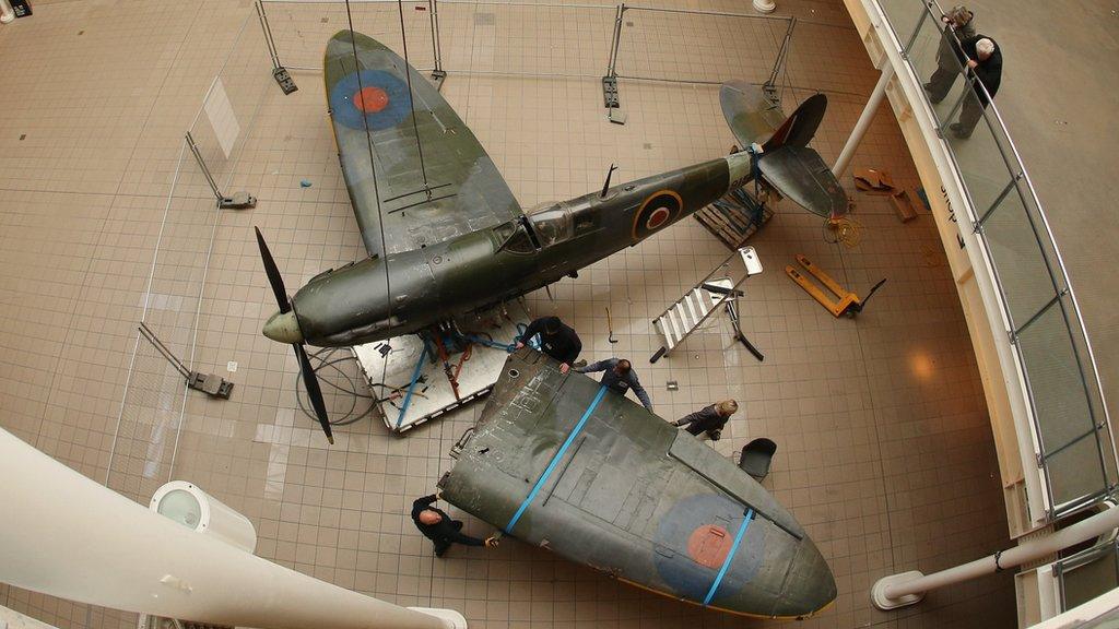 Spitfire being dismantled at the Imperial War Museum in London