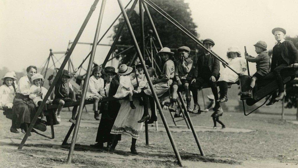 Children on a swing at Wicksteed Park in the 1920s