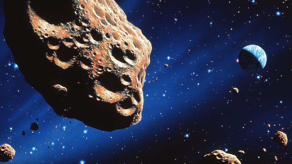 Asteroid and Earth artwork